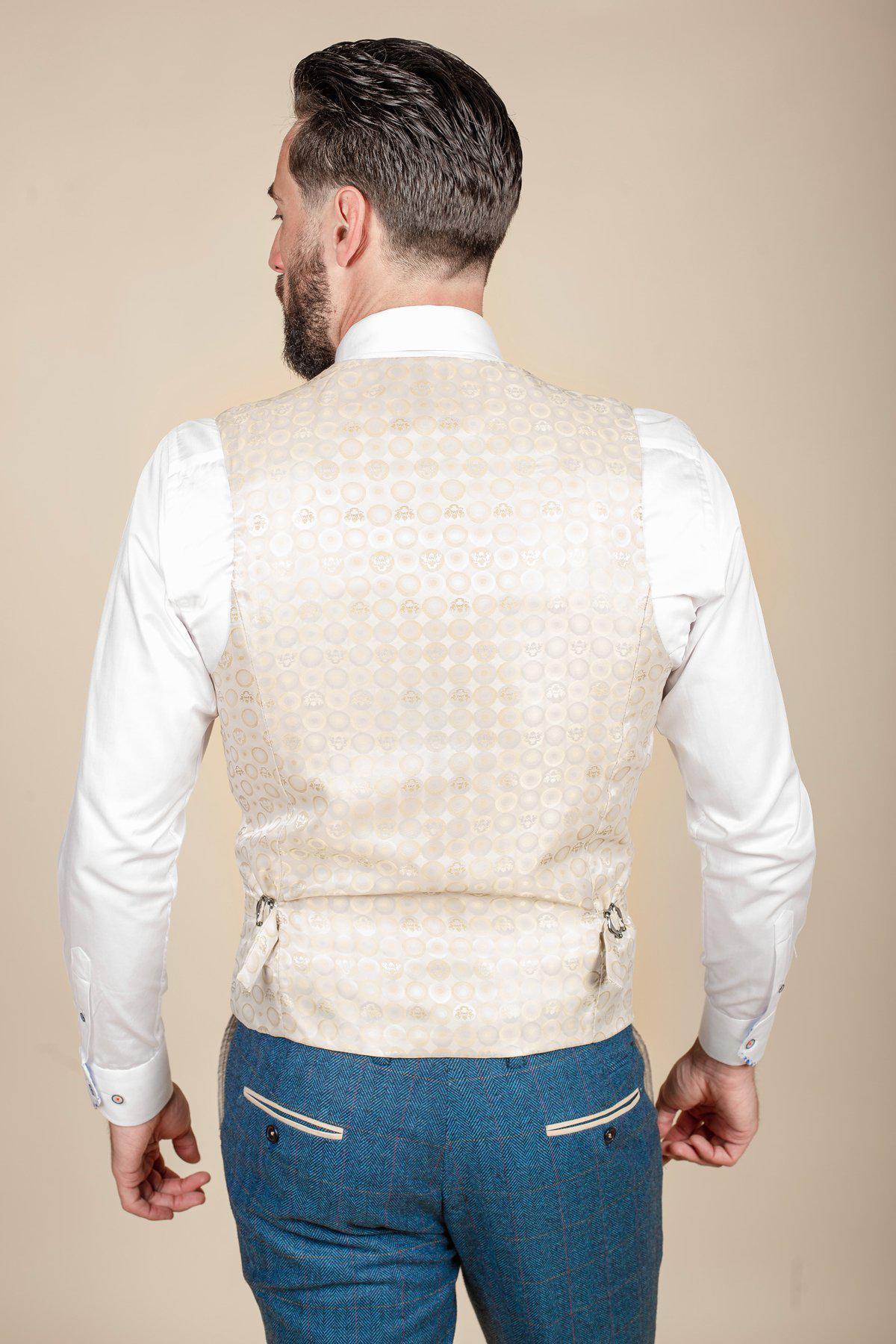 A man wears the marcdarcy DION Blue Tweed Check Suit paired with the Kelvin Cream Waistcoat, styled as a modern wedding suit.