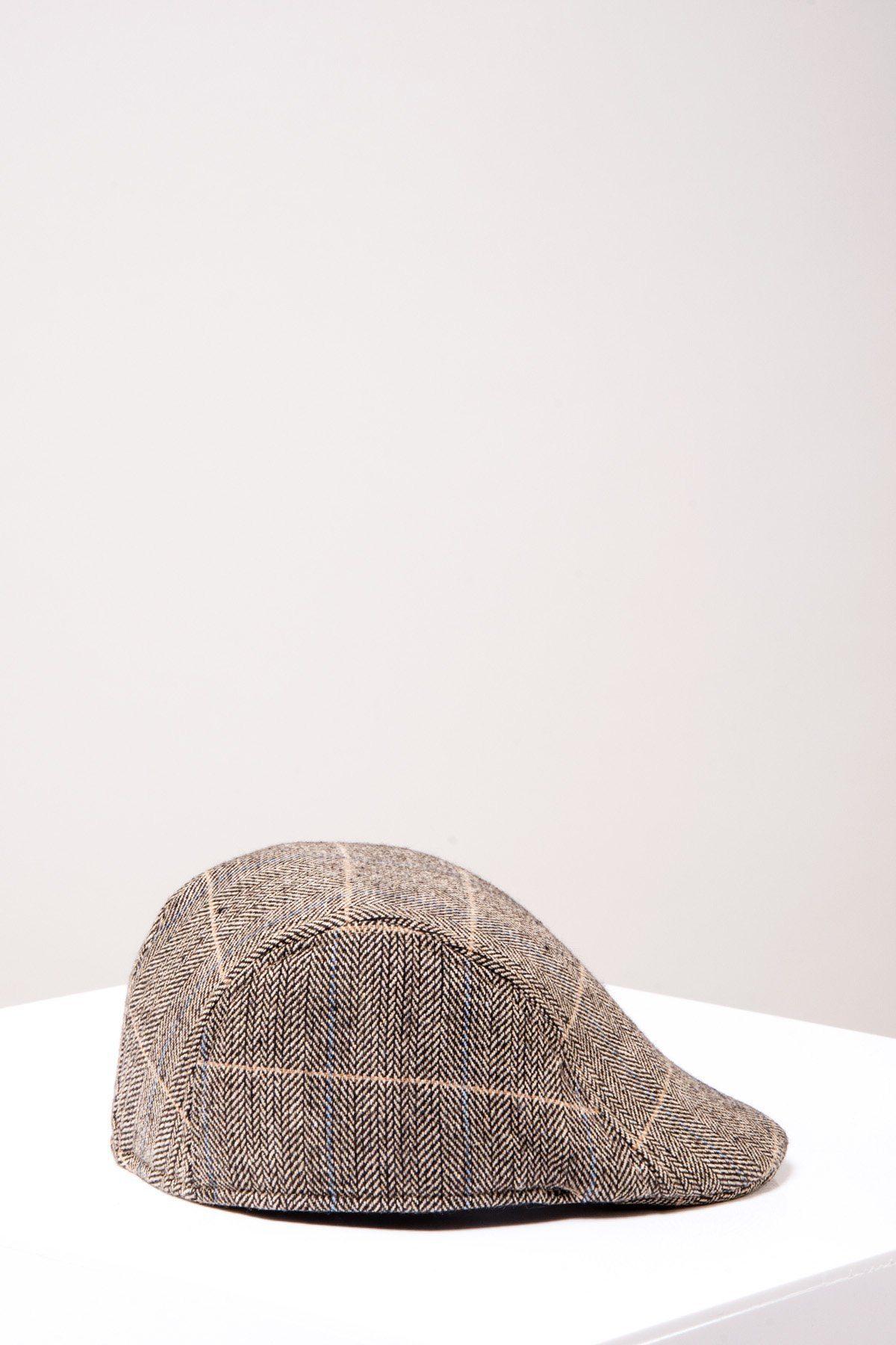 The Accessory TED - Tan Tweed Check Flat Cap features a classic herringbone check pattern and is shown on a white surface against a simple, light background.
