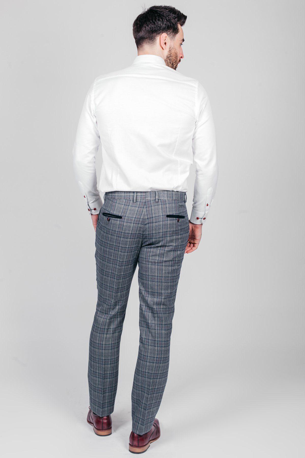 Man in white shirt and ENZO Blue Grey Check Tweed Trousers by marcdarcy, seen from the back.