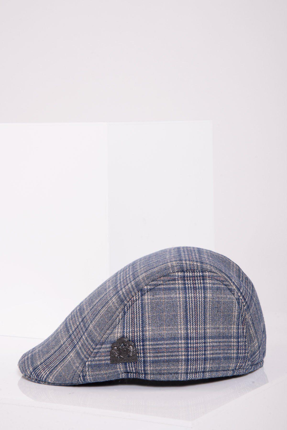The ENZO - Sky Stone Tweed Flat Cap by Accessory is displayed against a minimal white background, shown with the brim facing left.