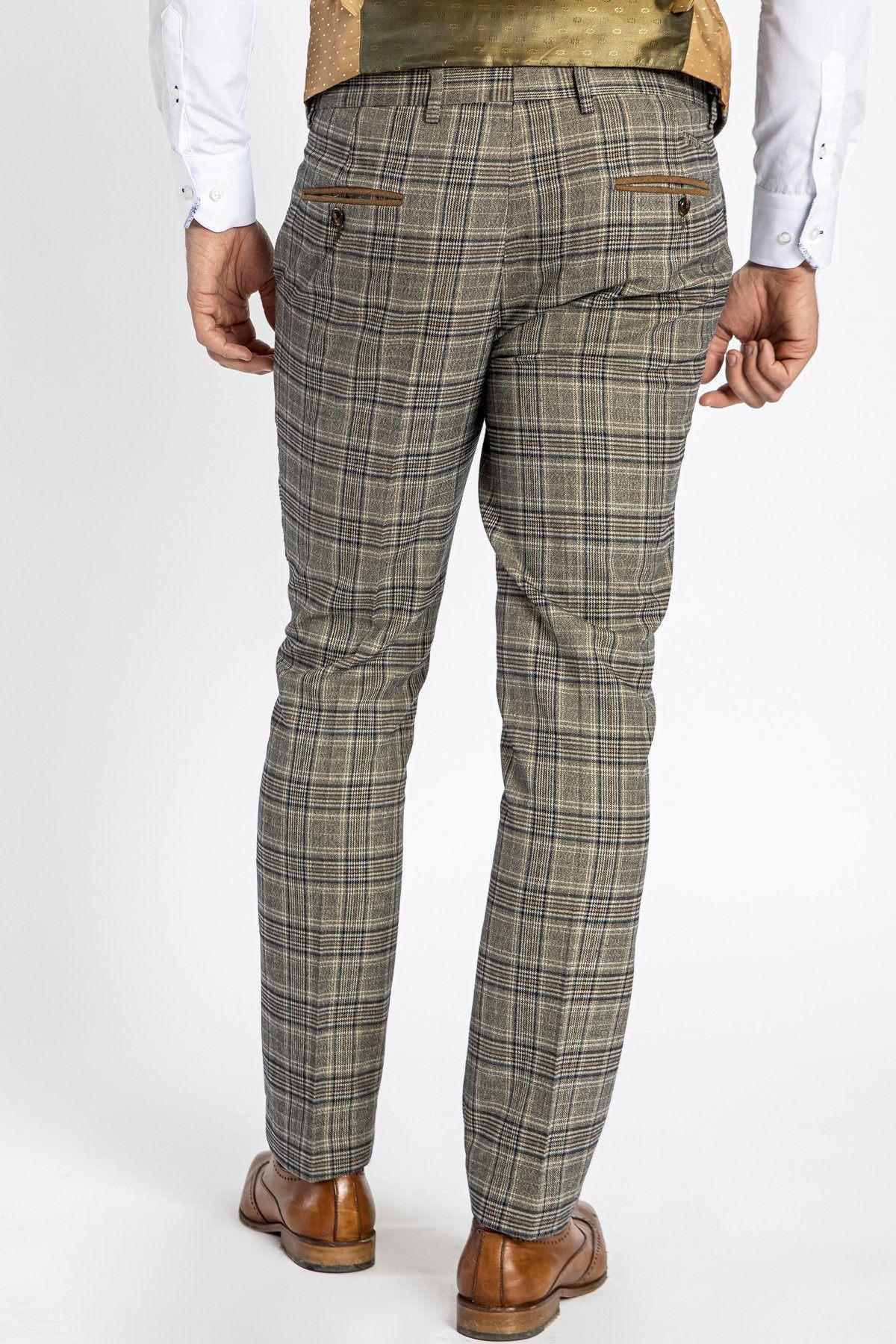 A man is shown from the back wearing marcdarcy ENZO Tan Check Tweed Trousers, a gold vest, white shirt, and brown dress shoes against a plain white background.