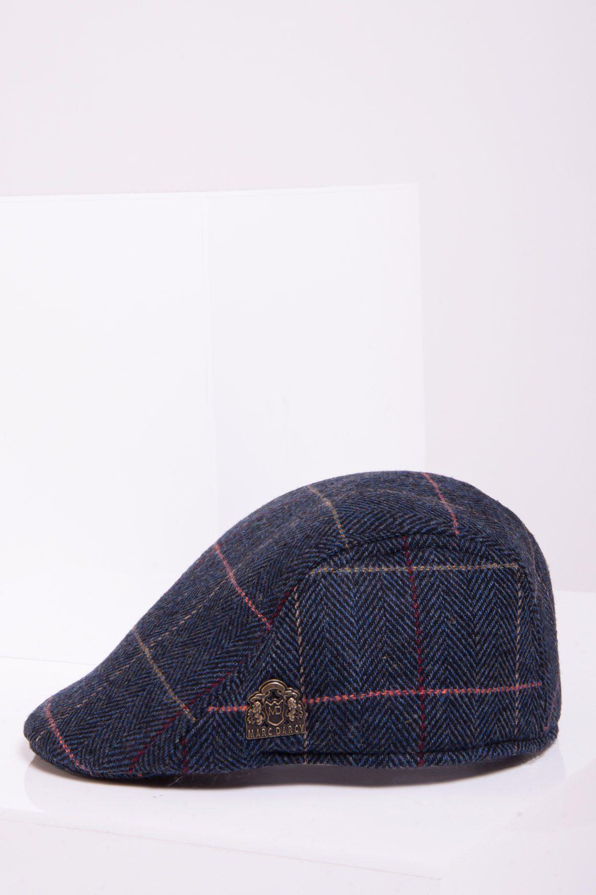 The ETON - Navy Blue Check Tweed Flat Cap by Accessory features subtle red and white plaid accents and a small Marc Darcy badge, shown on a plain white background.