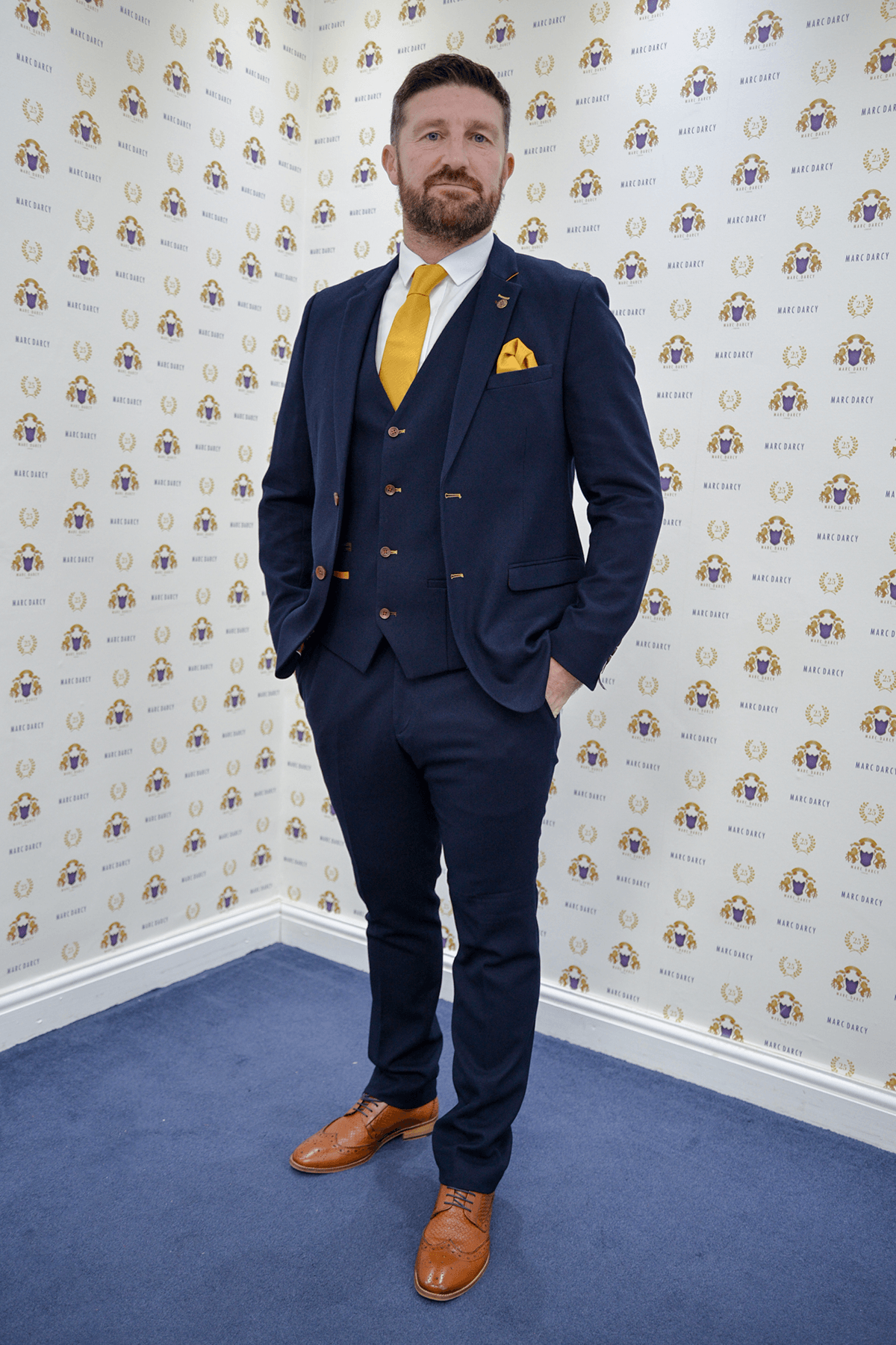 Former Footballer John Macken in JD4 Navy Suit Marc Darcy