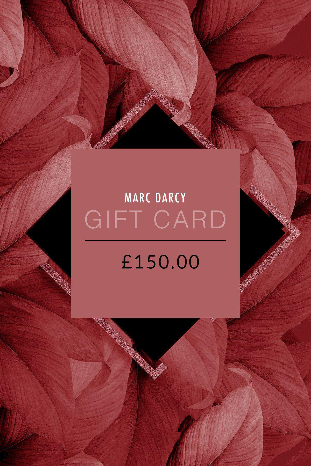 Give the gift of choice with a Marc Darcy Gift Card - £150.00, presented on a vivid background of deep red tropical leaves and bold geometric shapes.