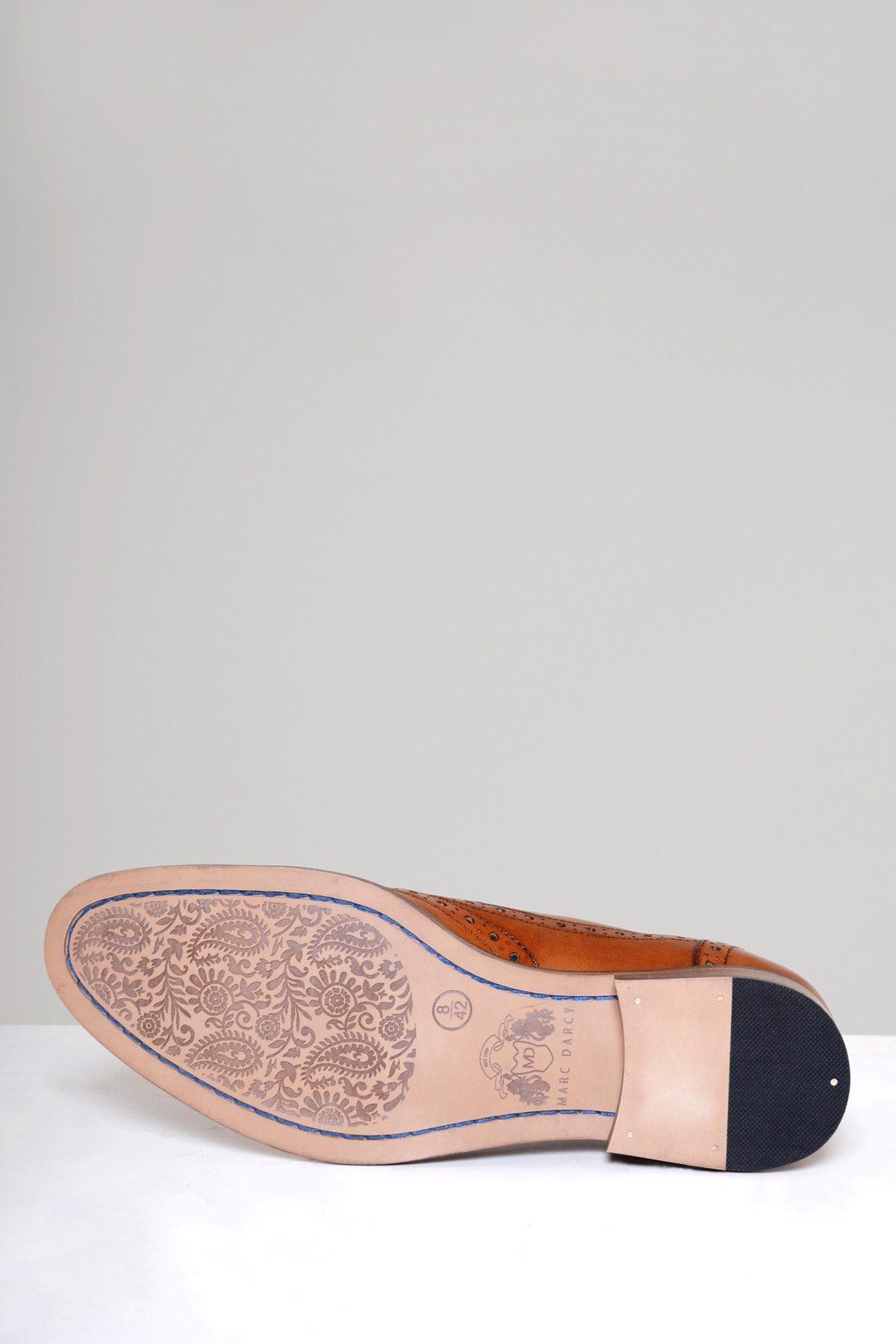 The GRAYSON Tan Leather Wingtip Brogue Shoe by Marc Darcy features rich full grain leather, brogue details, a paisley-patterned sole, and is available in size 8 (42) for men.