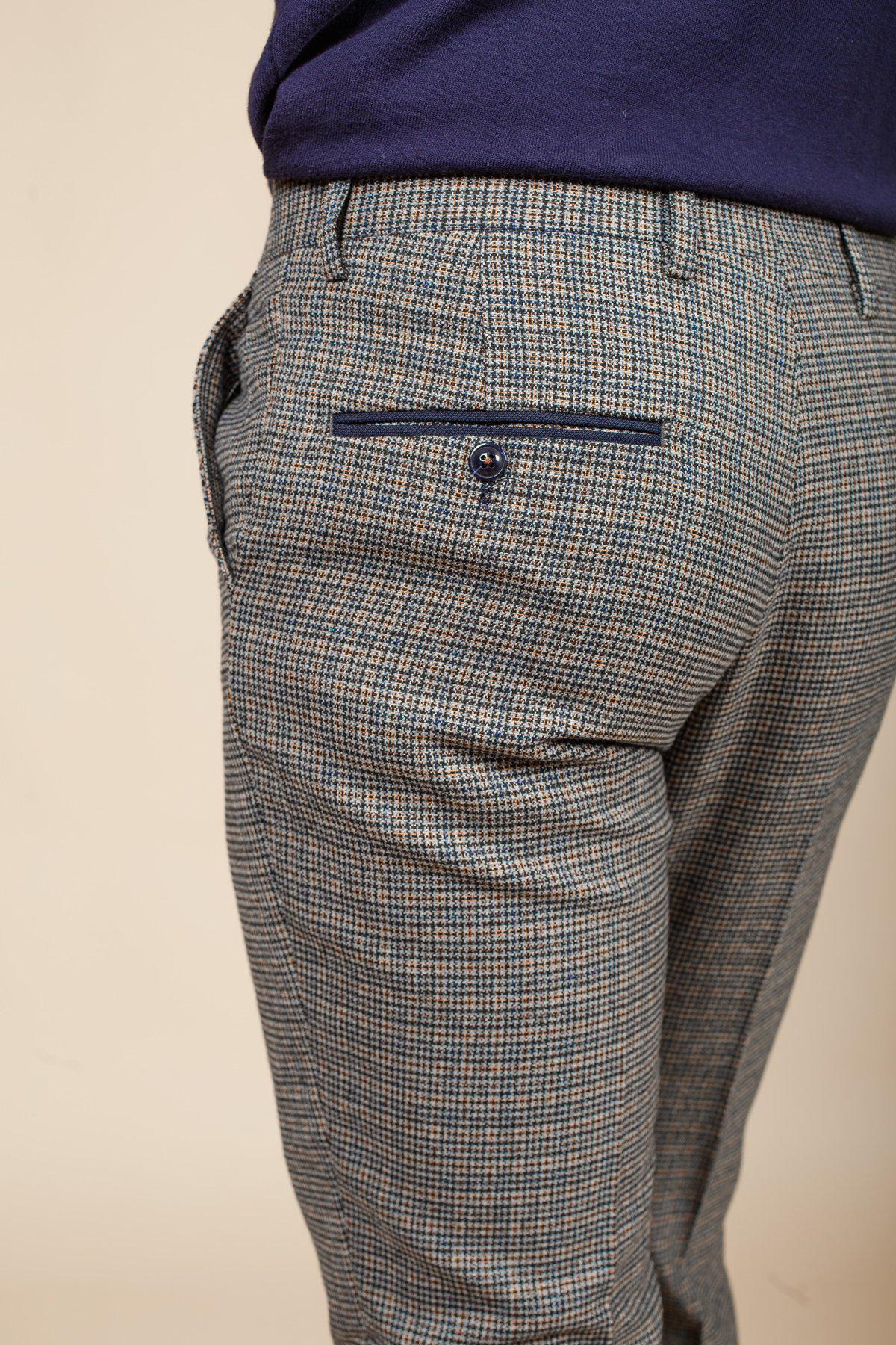 Close-up of the Hardwick Navy Tan Tweed Check Trousers by marcdarcy, highlighting the slim fit, navy trim pocket with button, and refined heritage style.