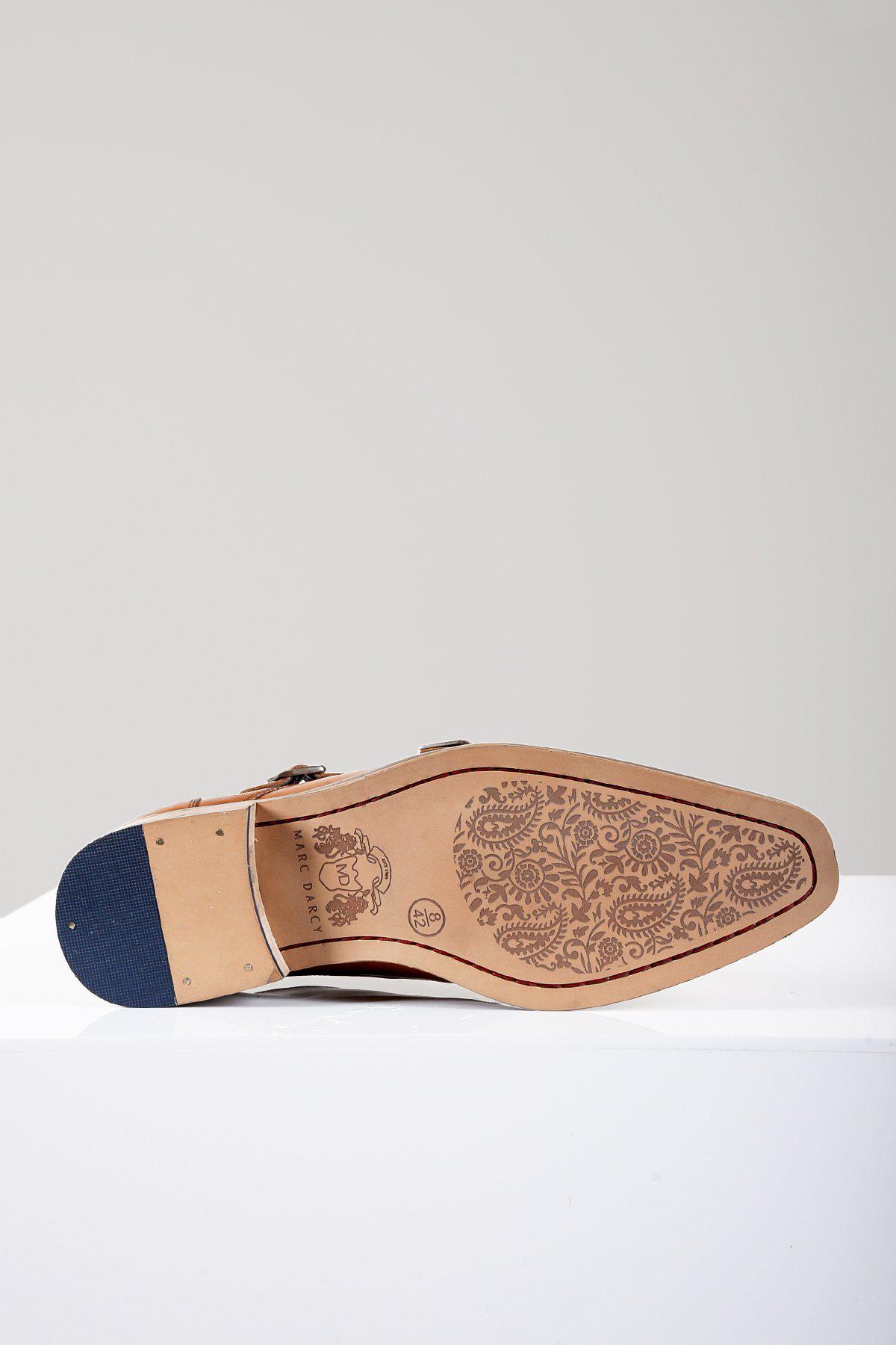Sole of the Marc Darcy HARRIS Tan Leather Double Strap Monk Shoe featuring a blue heel cap, intricate paisley pattern, and visible MD brand logo.