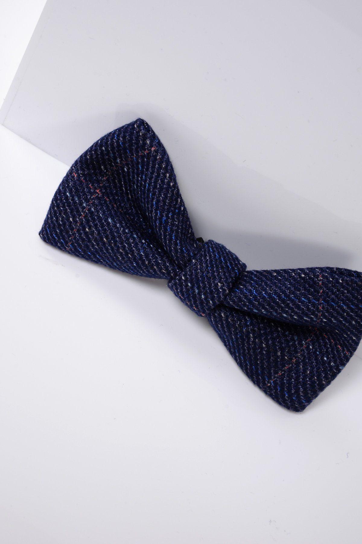 The Accessory HARRY – Indigo Tweed Check Bow Tie features thin white and red lines, an adjustable band, and is shown on a white surface with a soft shadow.