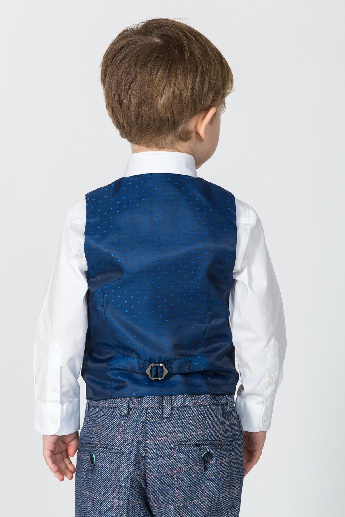 Back view of a young boy in the marcdarcy HILTON Children's Blue Tweed Check Three Piece Suit—a charming ring bearer outfit with vintage-inspired check details.