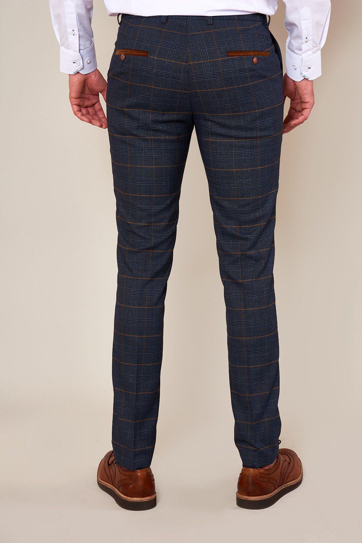A person wearing a white dress shirt, marcdarcy JENSON Skinny Fit Marine Navy Check Trousers, and brown dress shoes is shown from the back against a neutral background.