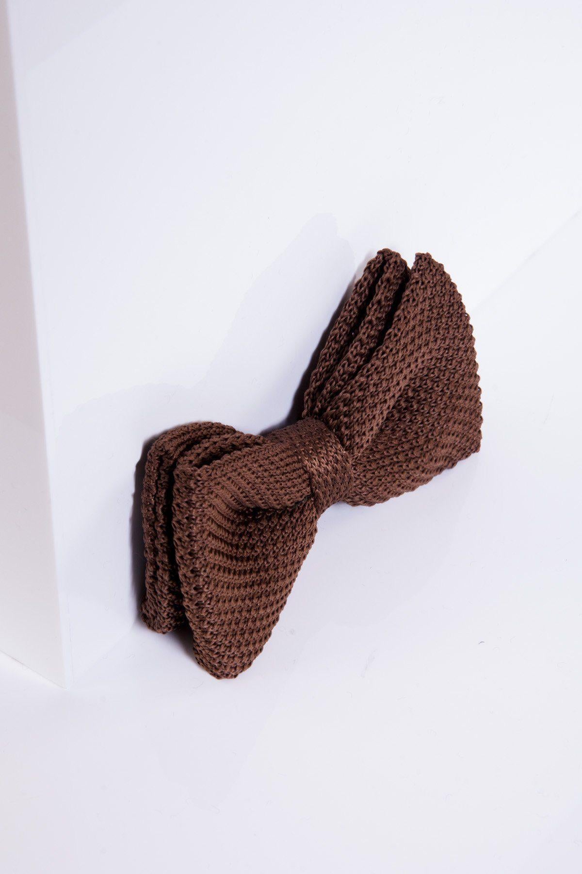 The marcdarcy KB - Knitted Double Layer Bow Tie In Tan is showcased on a white, angular background with a soft shadow—ideal for autumn and winter, and perfect for any pre-tied bow tie enthusiast.