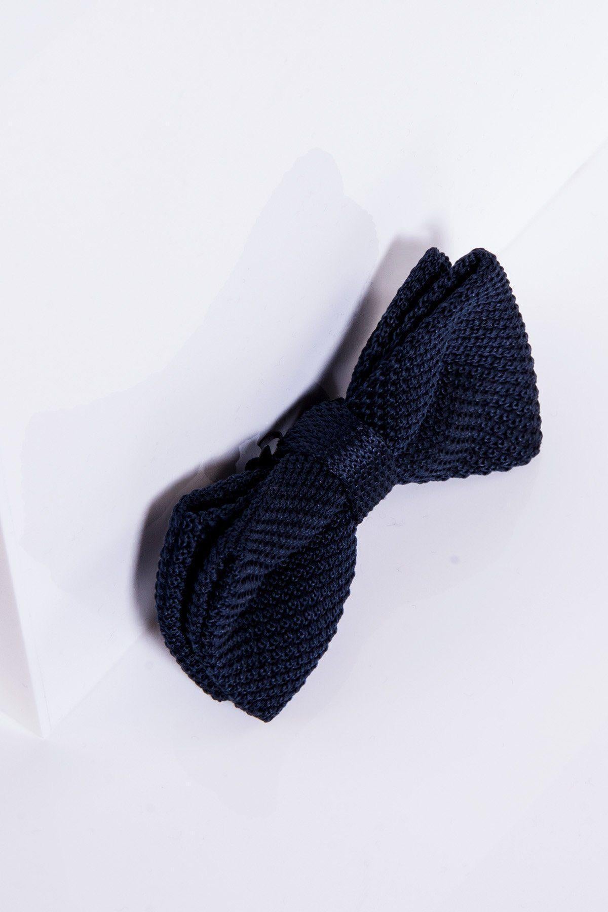 The marcdarcy KB - Knitted Double Layer Bow Tie In Navy is shown at an angle on a white background, highlighting its textured, contemporary design.