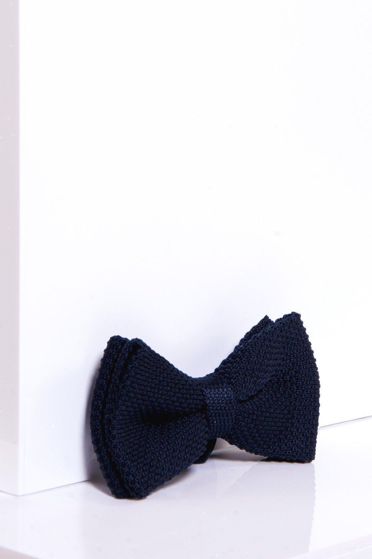 The marcdarcy KB - Knitted Double Layer Bow Tie In Navy, pre-tied with an adjustable strap, is displayed against a white background for a bold, elegant contrast.