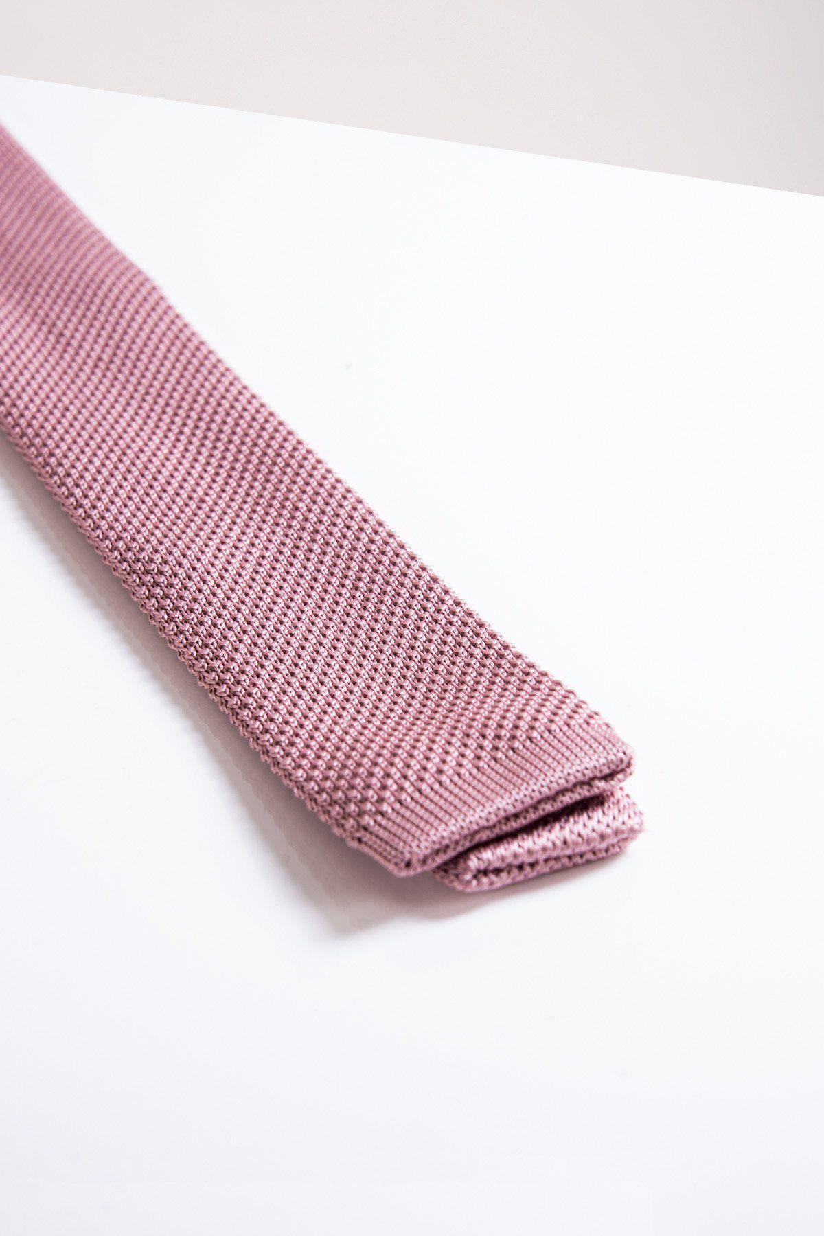 The KT - Blush Pink Knitted Tie by Accessory features a refined texture, making it an elegant addition to your accessory collection or the perfect finishing touch for your wedding ensemble.