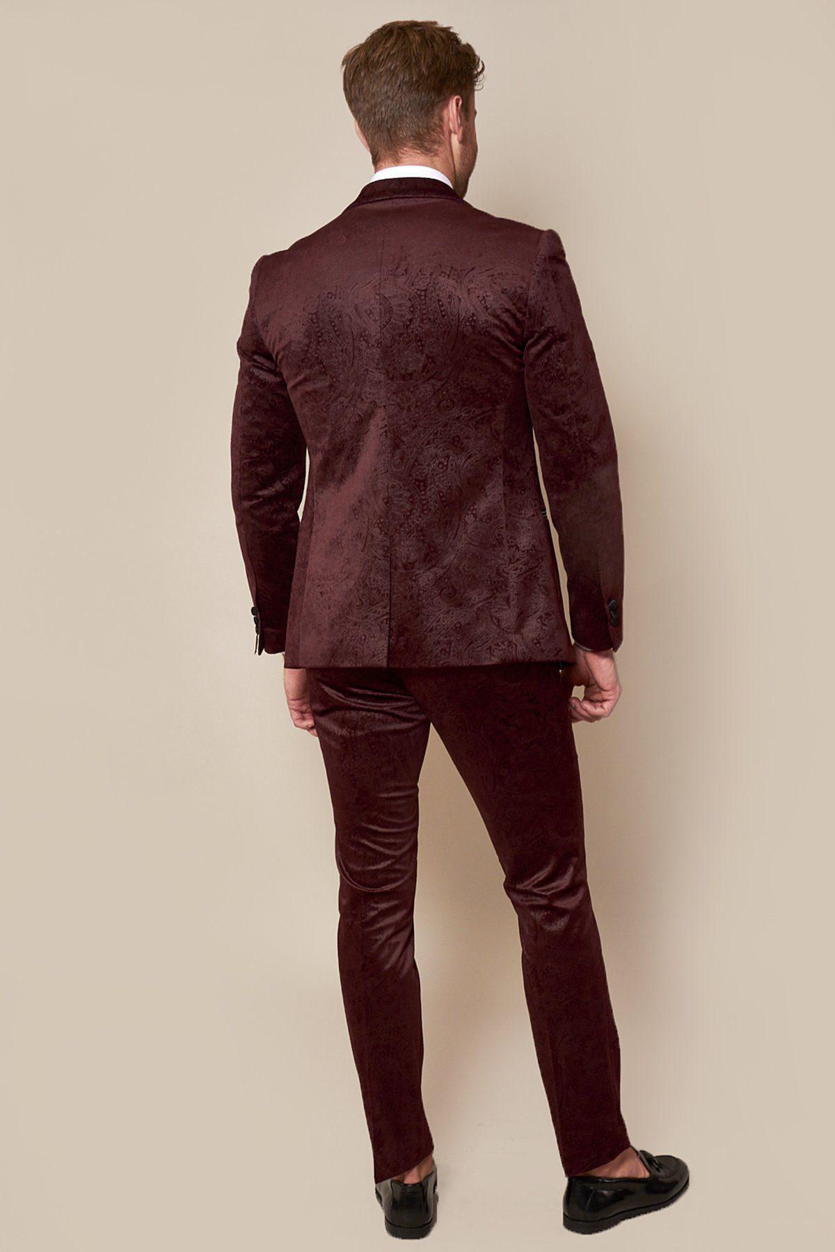 Rear view of Fenerbahçe and Brazil midfielder Fred wearing a Marc Darcy Simon Wine velvet suit.