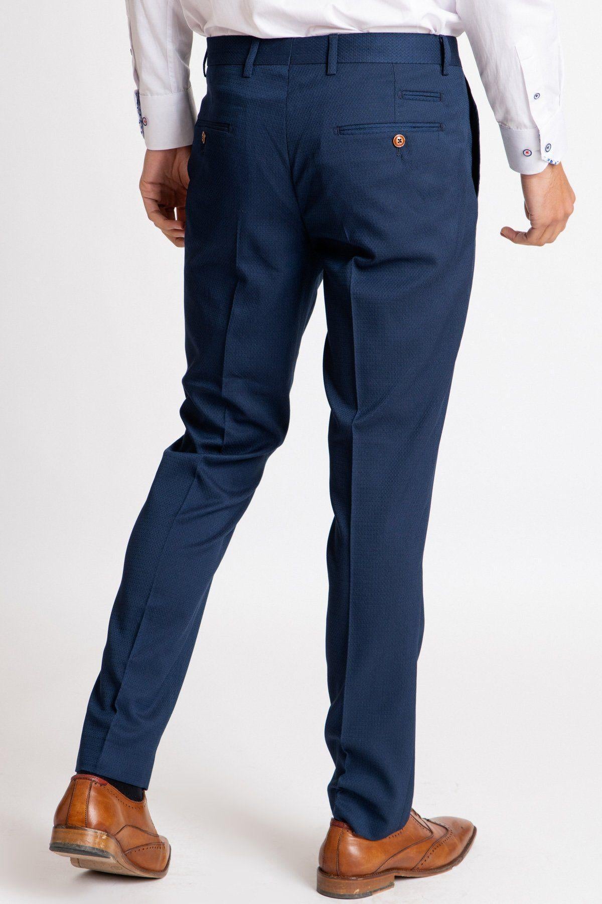 A man is shown from the back on a white background wearing marcdarcy’s The Everton Collection | Dominic Calvert-Lewin In The MAX Royal Blue Suit.