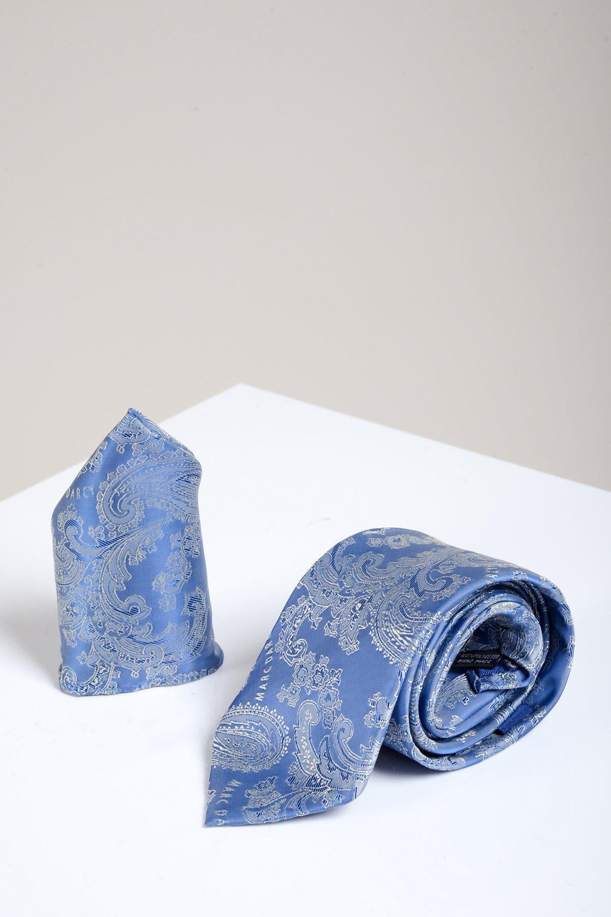 The Accessory MD PAISLEY - Sky Blue Paisley Tie and Pocket Square Set, crafted in silk, is shown on a white surface—an ideal choice to elevate your formal style.
