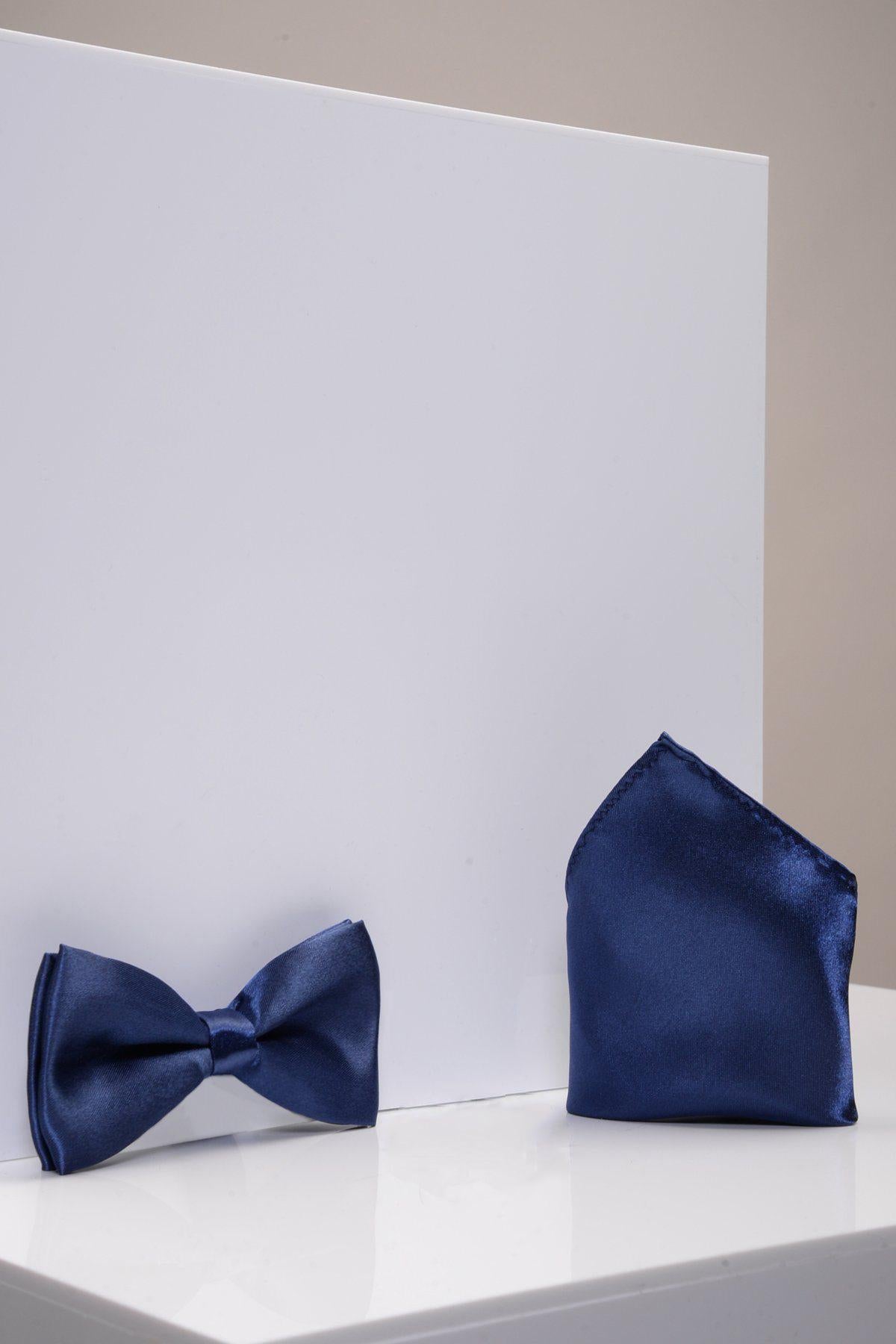 The Accessory STANLEY Satin Bow Tie and Pocket Square Set in Navy is shown against a plain white background, perfect for formal wear ensembles.
