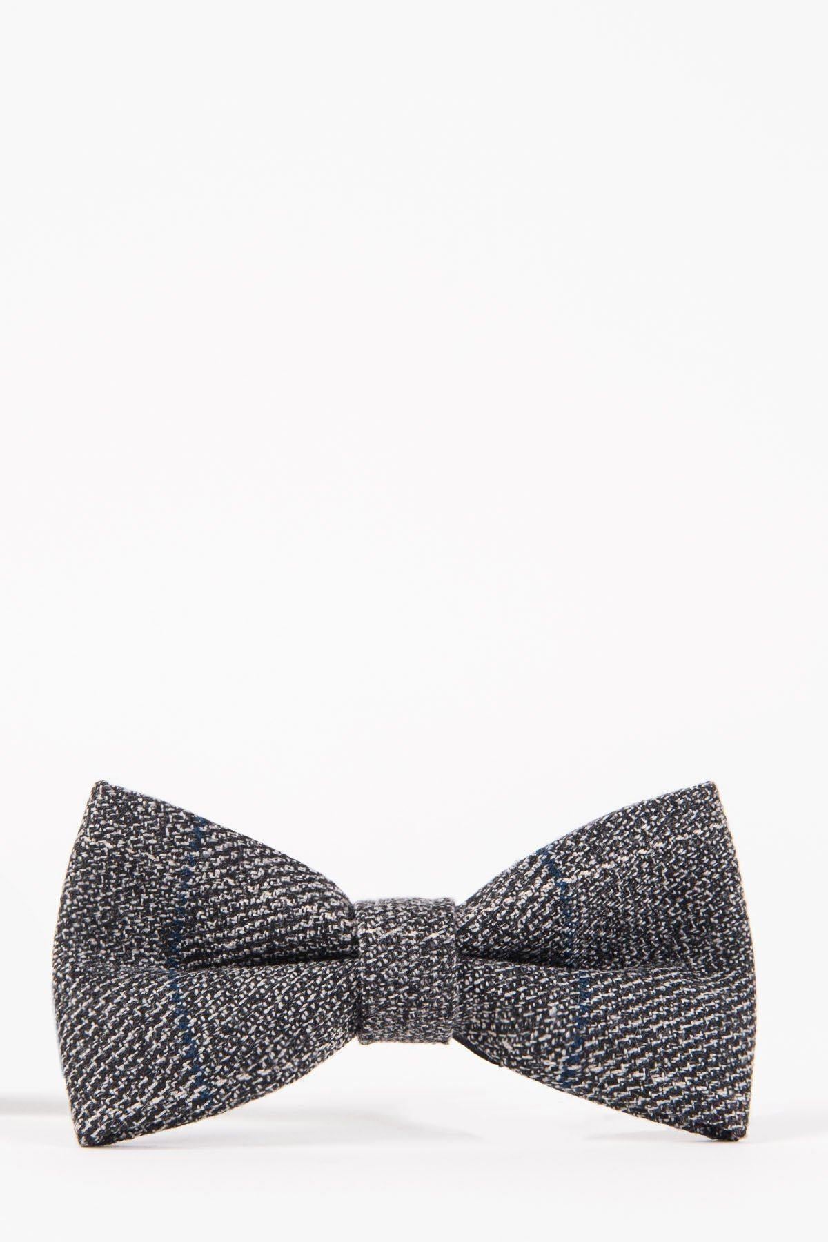 The SCOTT - Grey Check Tweed Bow Tie by Accessory features a textured plaid design, showcased on a plain white background for a modern and stylish appearance.
