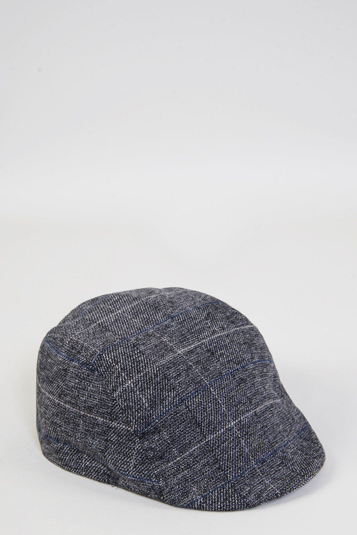 The SCOTT Grey Check Tweed Flat Cap by Accessory features a classic heritage check in grey, white, and blue plaid—evoking the timeless style of the iconic Peaky Blinders flat cap.