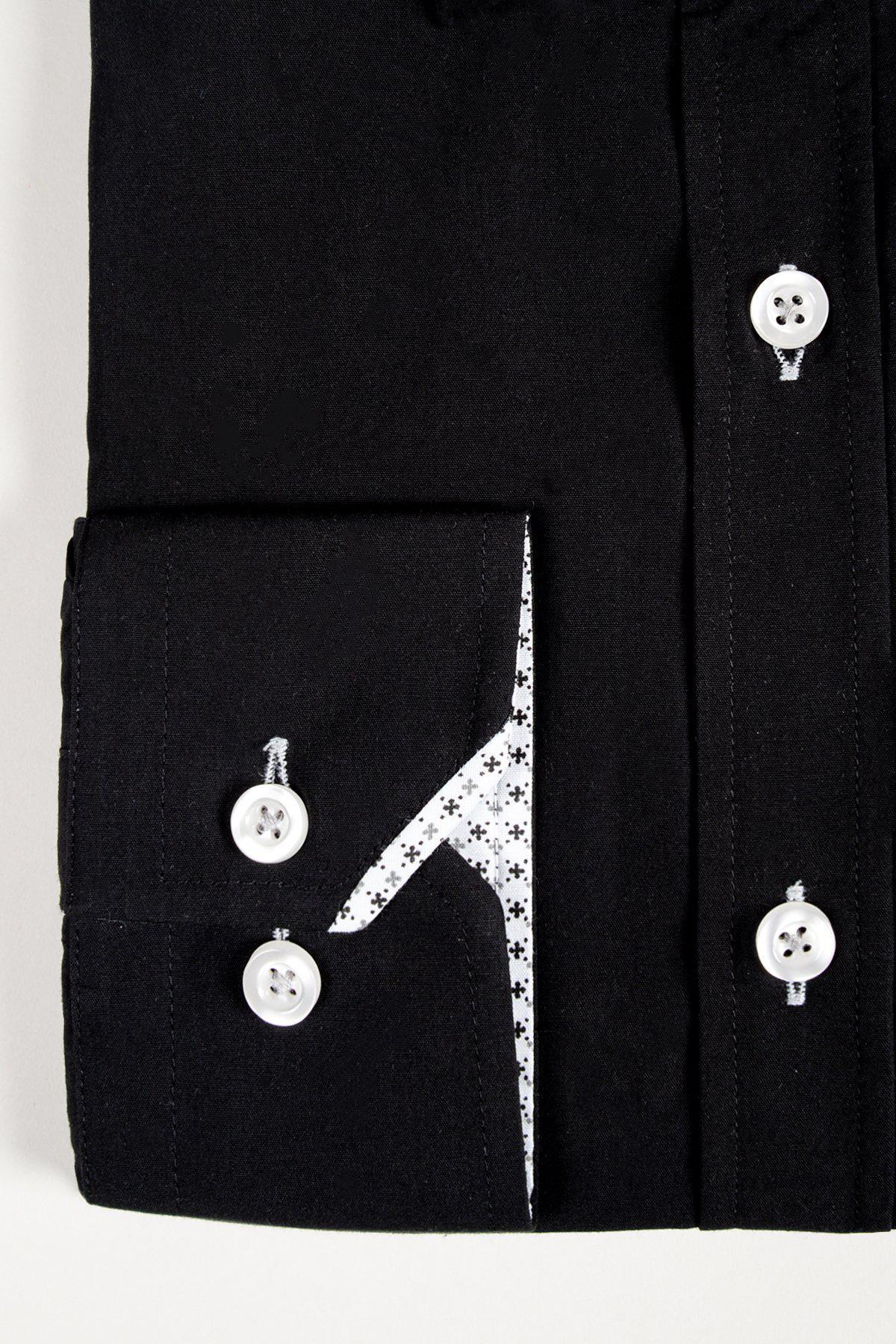 A close-up of the marcdarcy SERGIO black long sleeve shirt cuff in a classic fit, showing white buttons and a cotton blend lining with a subtle black cross pattern on the inner edge.