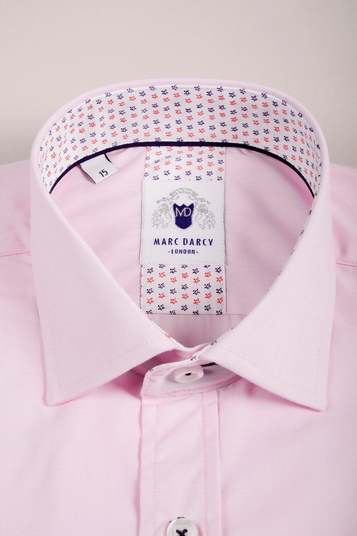 A close-up of the marcdarcy SERGIO pink long sleeve shirt, tailored fit, with patterned red and blue accents on the inner collar and a Marc Darcy London crest label.