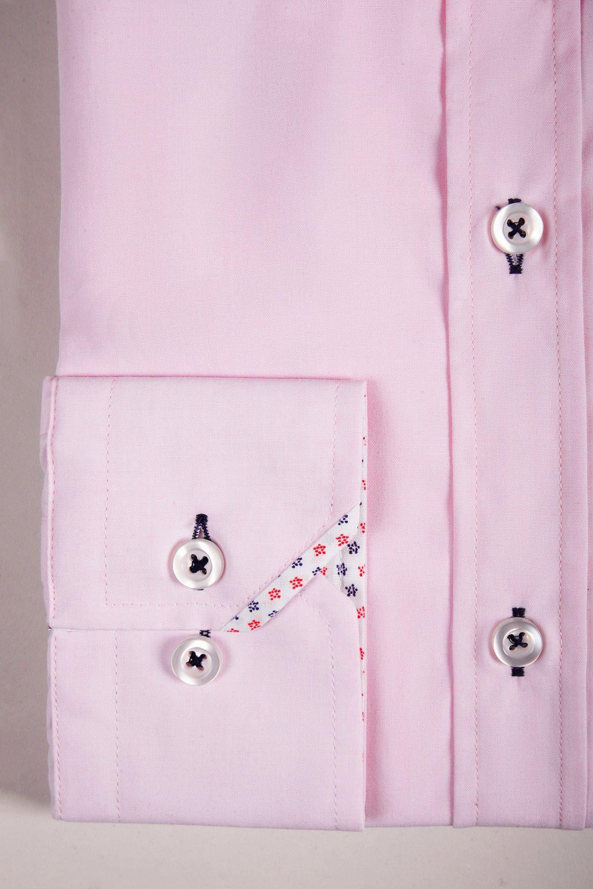 The marcdarcy SERGIO Pink Long Sleeve Shirt features a folded light pink poly-mix sleeve with white buttons, dark stitching, and a tailored fit cuff lined in white fabric with red and navy floral accents.