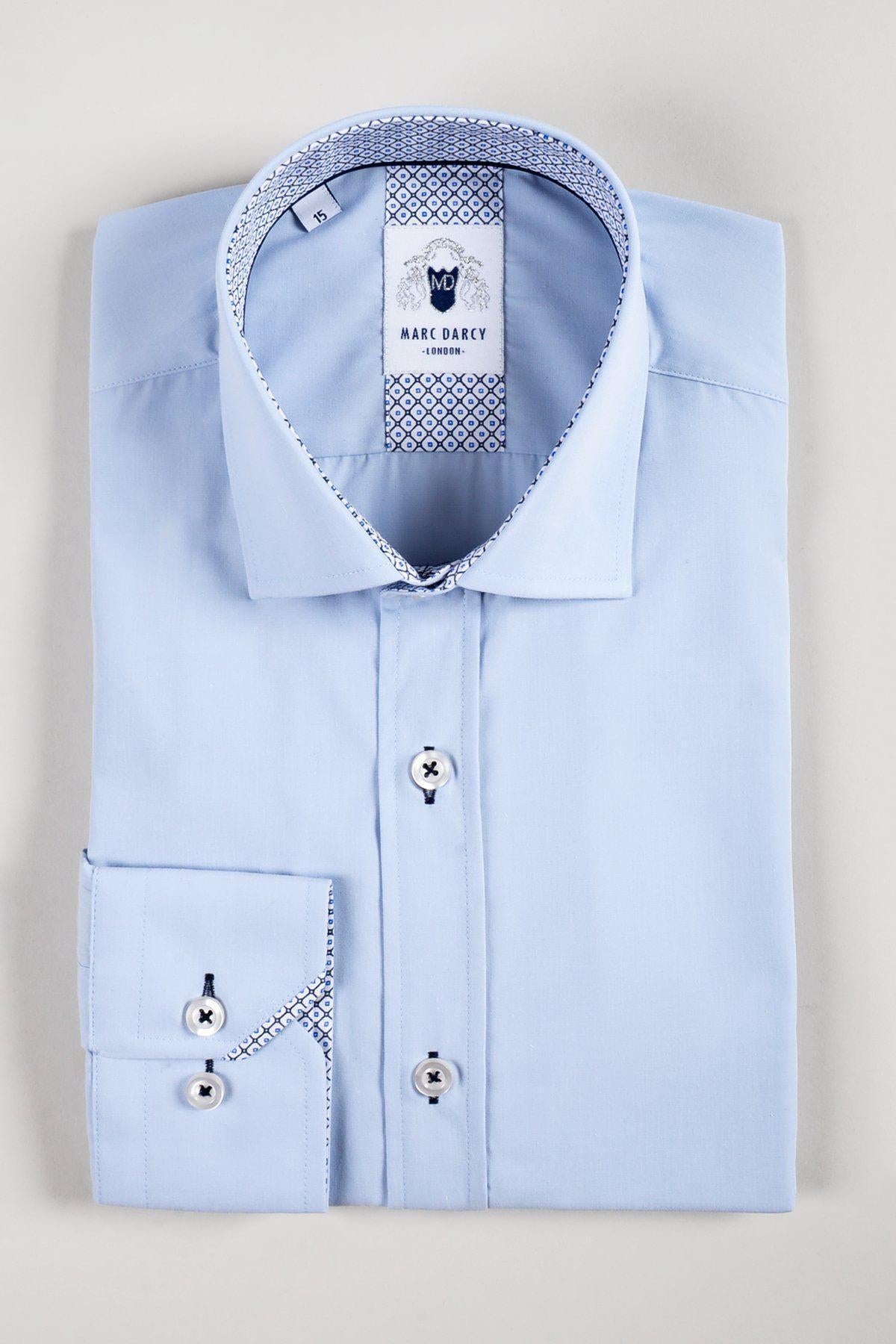 The SERGIO Sky Blue Long Sleeve Shirt by marcdarcy features a patterned inner collar and cuffs, white buttons, and a visible brand label—making it perfect for polished office attire.