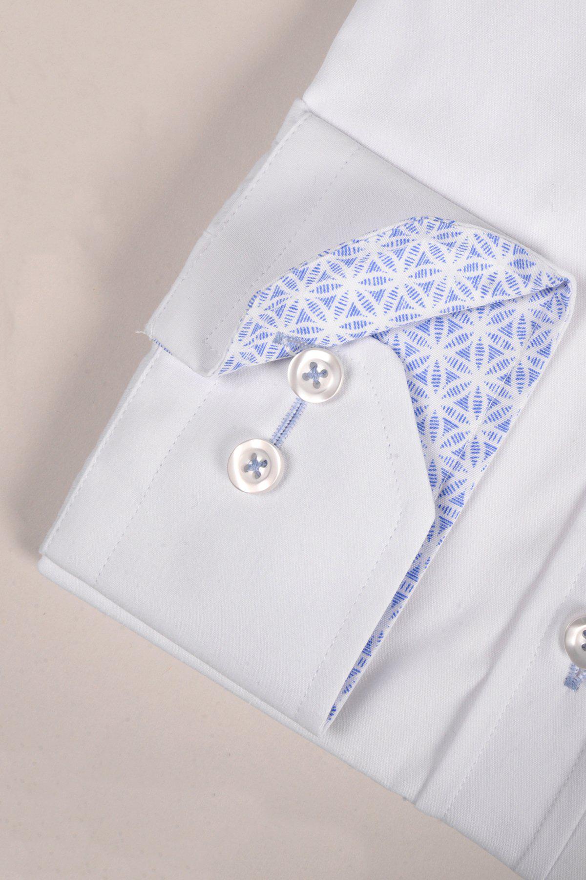 Close-up of the marcdarcy SERGIO white long sleeve shirt’s classic fit cuff with two white buttons and a pocket revealing blue geometric patterned lining, crafted from soft poly-cotton.