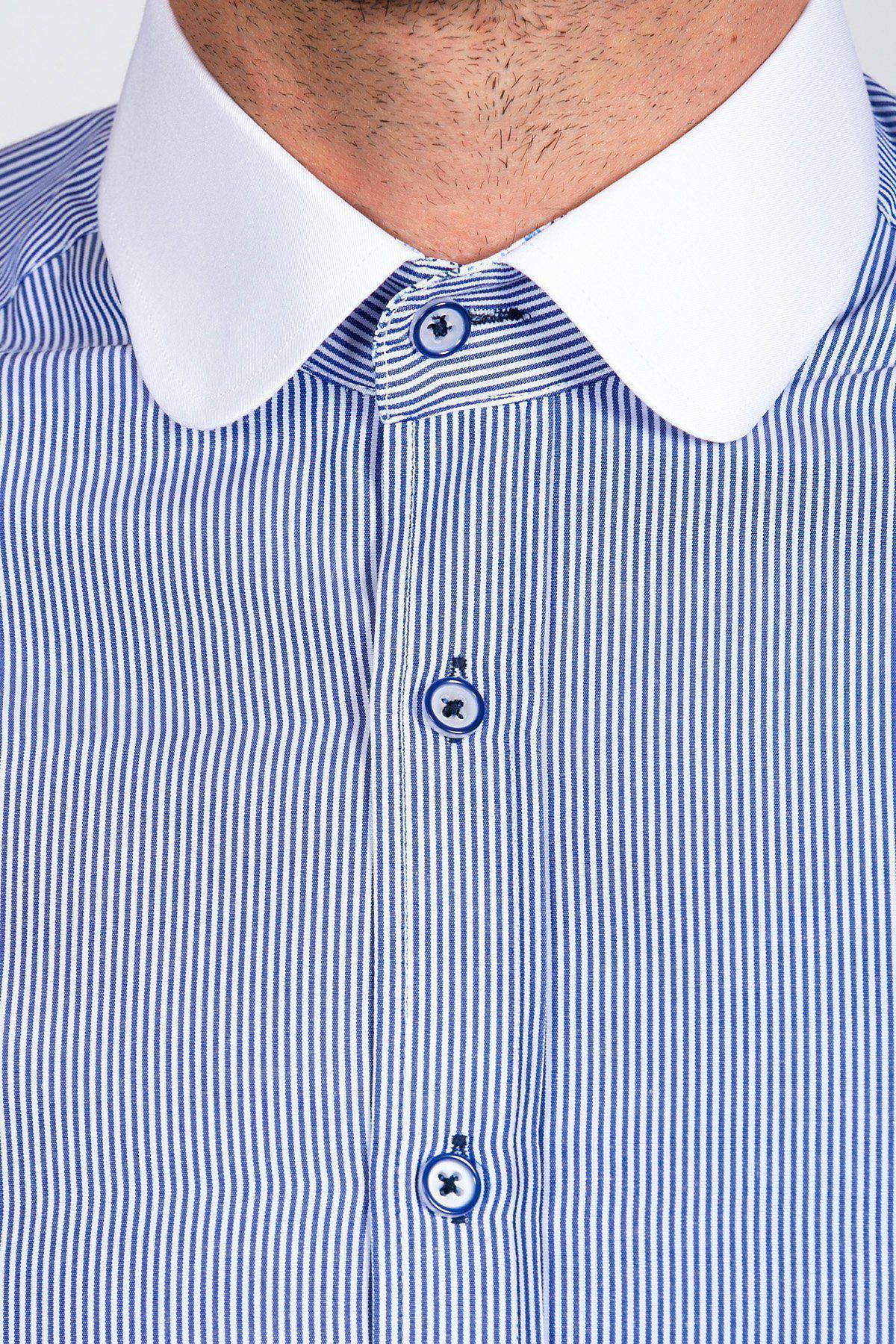 Close-up of a man wearing the Marc Darcy SHELBY Navy Blue Stripe Penny Collar Shirt, featuring crisp stripes and blue buttons.