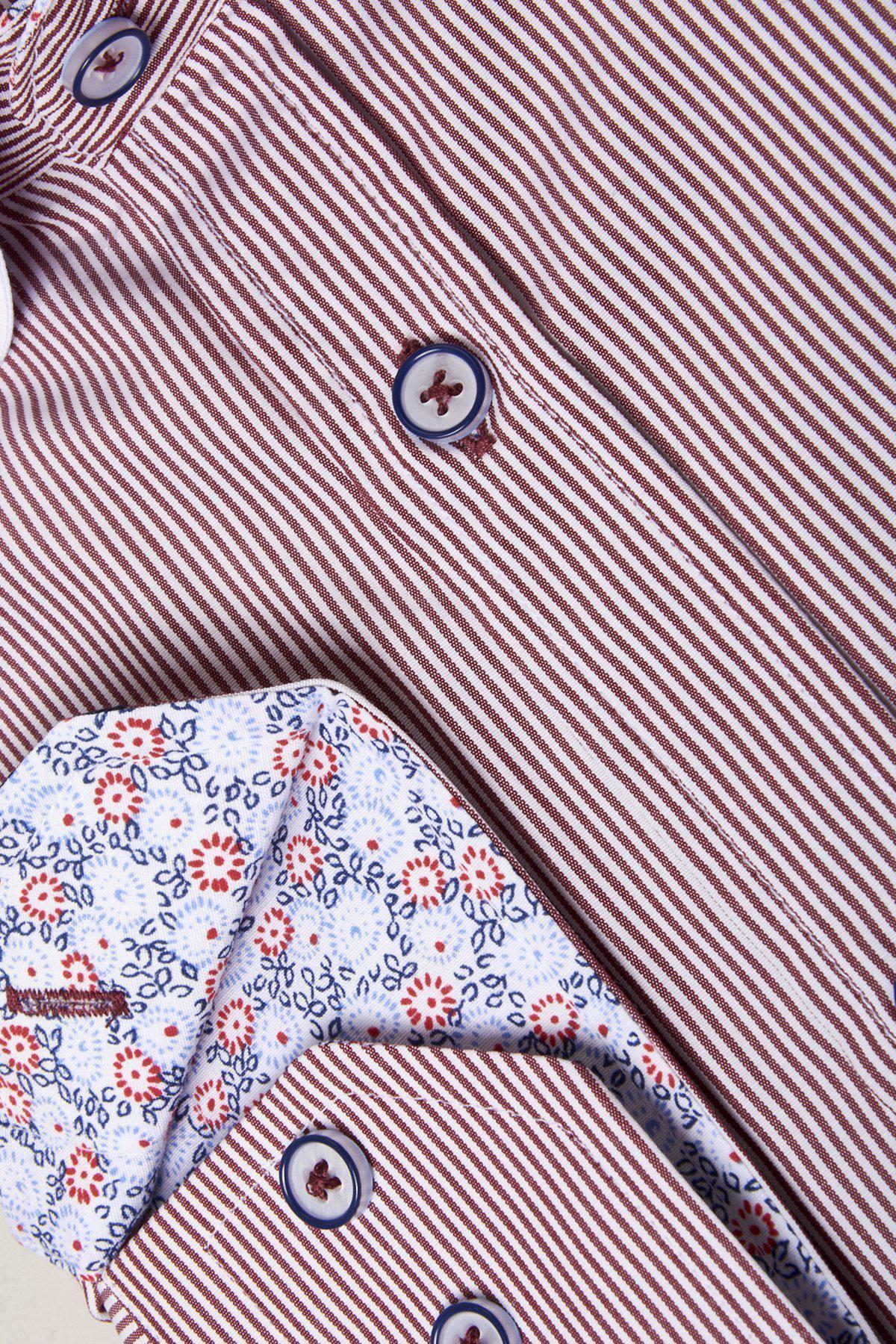 Close-up of the Marc Darcy SHELBY Wine Stripe Penny Collar Shirt, featuring thin red and white vertical stripes, blue buttons, and a turned-up cuff revealing a contrasting inner floral fabric in blue and red.