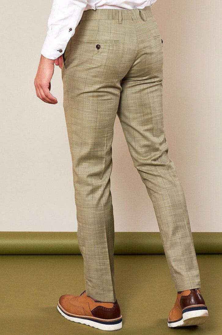 Man wears marcdarcy SID - Mustard Beige Check Trousers styled with a pastel mustard sharkskin suit and brown shoes.