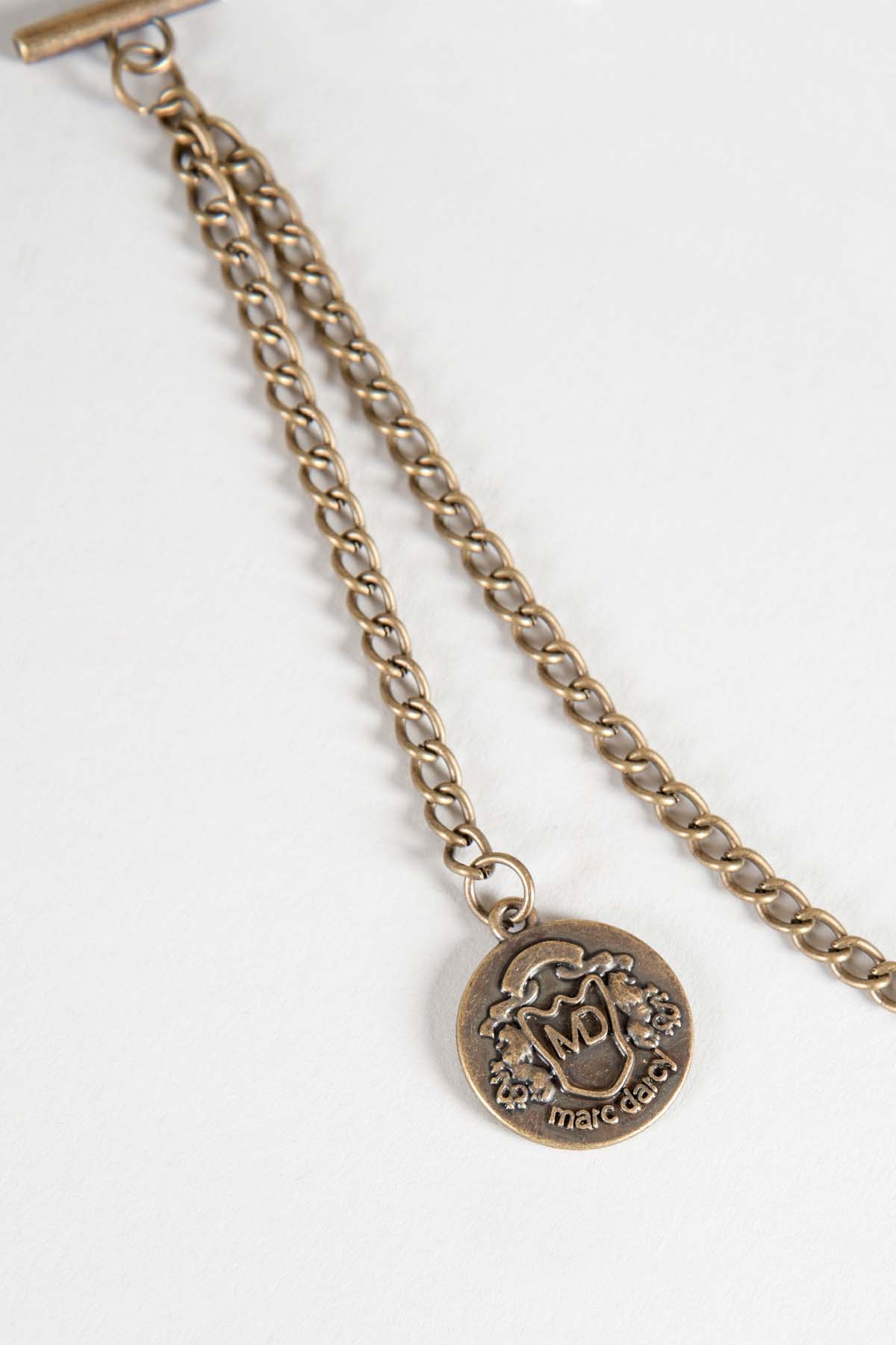 Antique style gold plated Marc Darcy T-Bar waistcoat chain with round MD logo pendant, supplied in a velvet keepsake pouch.