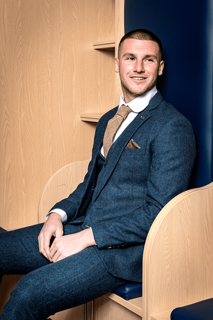 Man wearing men's The WBA Collection - DION Tweed Suit As Worn By Sam Johnstone- Marc Darcy Menswear