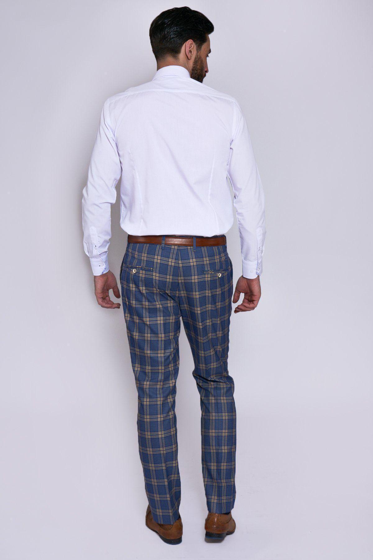 A man wears the marcdarcy TONY Blue Yellow Check Suit with Single Breasted Waistcoat, paired with a white shirt, brown belt, and brown shoes—a sharp slim-fit look perfect for summer.