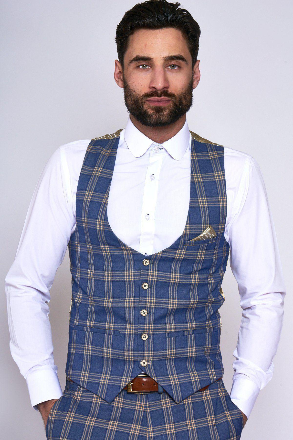 Man with dark hair and beard wears the marcdarcy TONY Blue Yellow Check Suit featuring a single breasted waistcoat over a white shirt, posing against a plain light background.