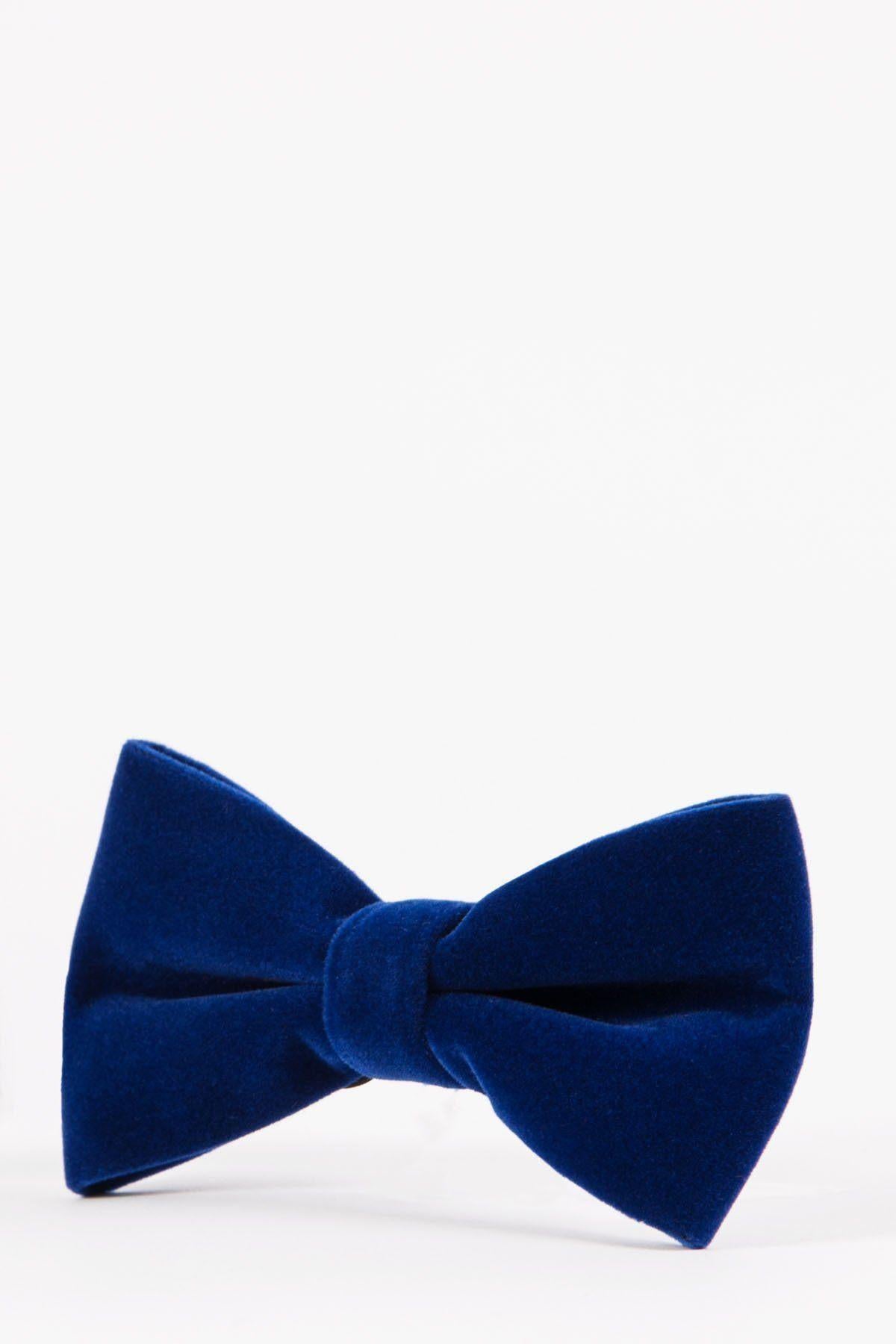 The Accessory VELVET Electric Blue Velvet Bow Tie is featured against a plain white background, making it an ideal choice for any black tie event.